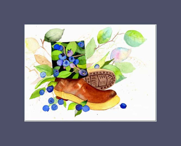 xtratuf boot with berries lining the inside surrounded with salal leaves and fallen blueberries in a blue mat