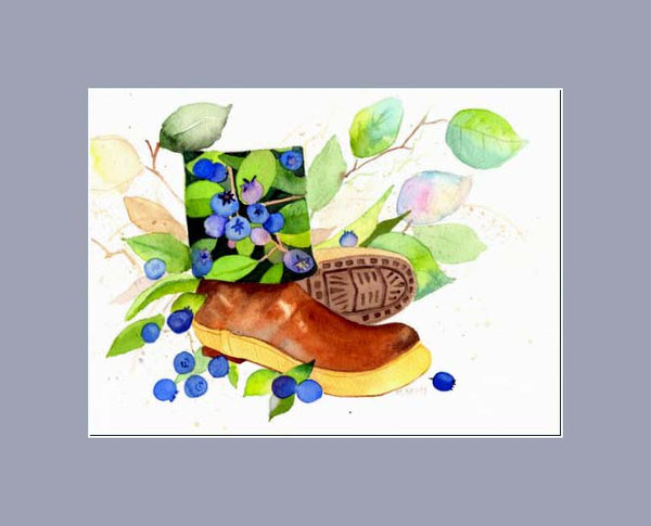 xtratuf boot with berries lining the inside surrounded with salal leaves and fallen blueberries in a gray mat