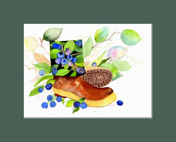 xtratuf boot with berries lining the inside surrounded with salal leaves and fallen blueberries  in a green mat