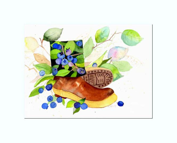 xtratuf boot with berries lining the inside surrounded with salal leaves and fallen blueberries in a white mat